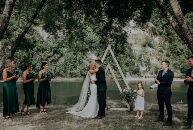 Riverside wedding venue ceremony setup at Rathmoy Estate